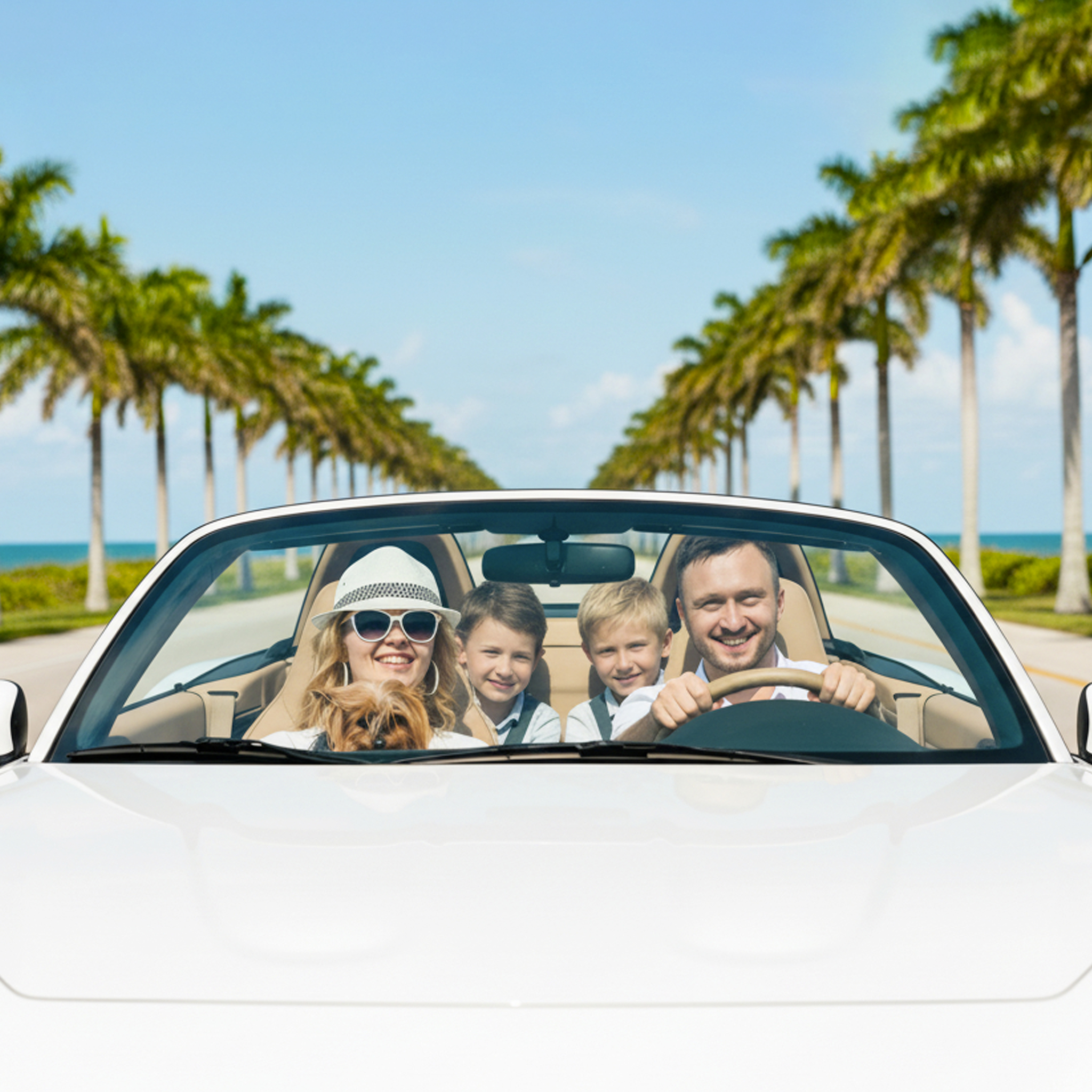 A person with a backpack looking out over a vast mountain valley